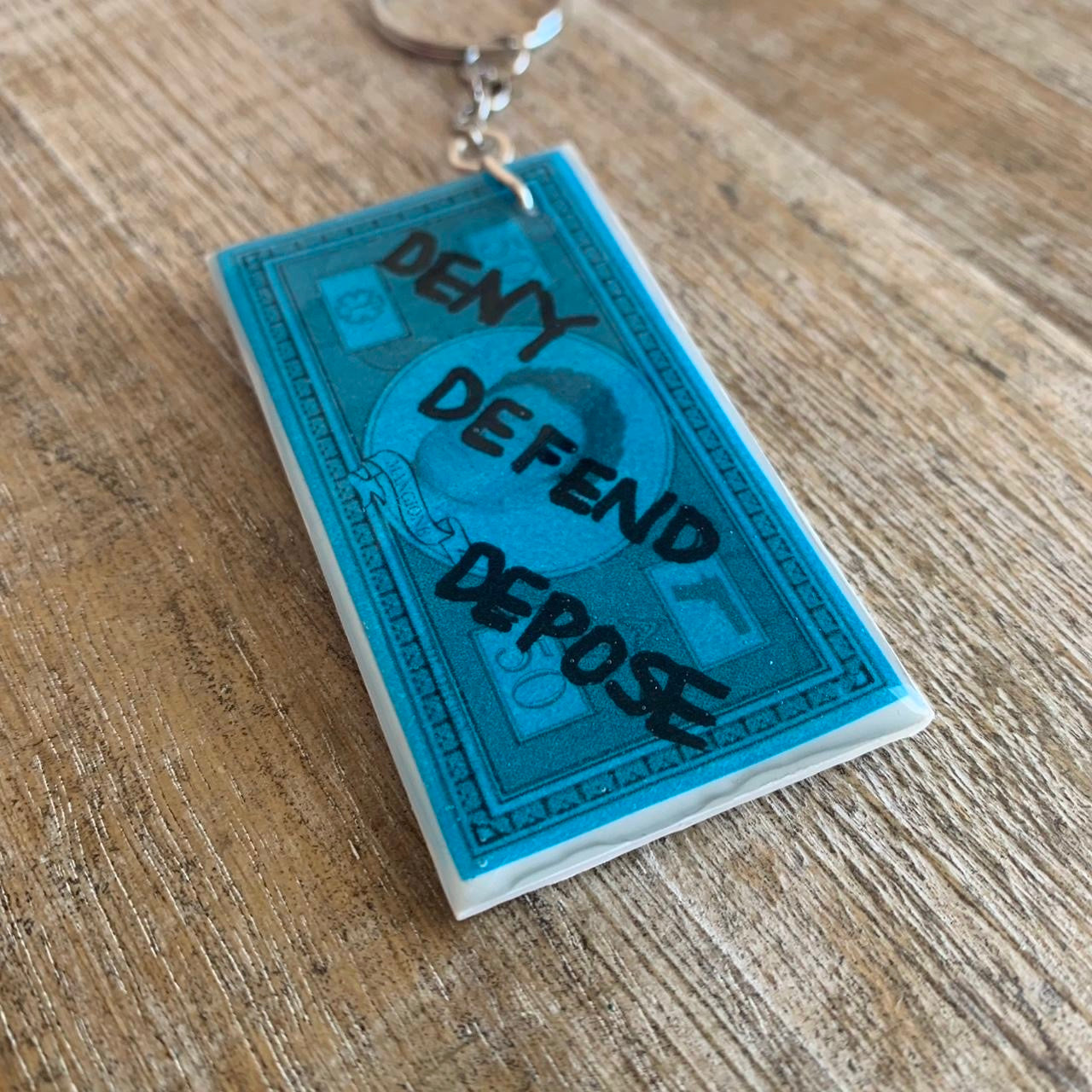 Deny Defend Depose Money Luigi Polymer Clay Keychain