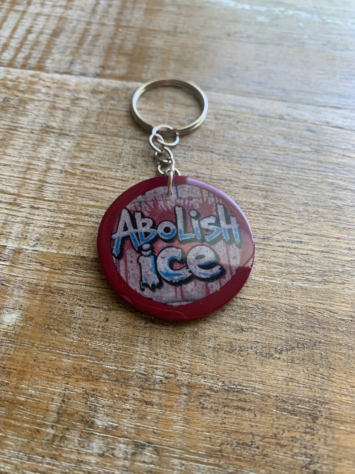 Abolish Ice Burgundy Polymer Clay Keychain
