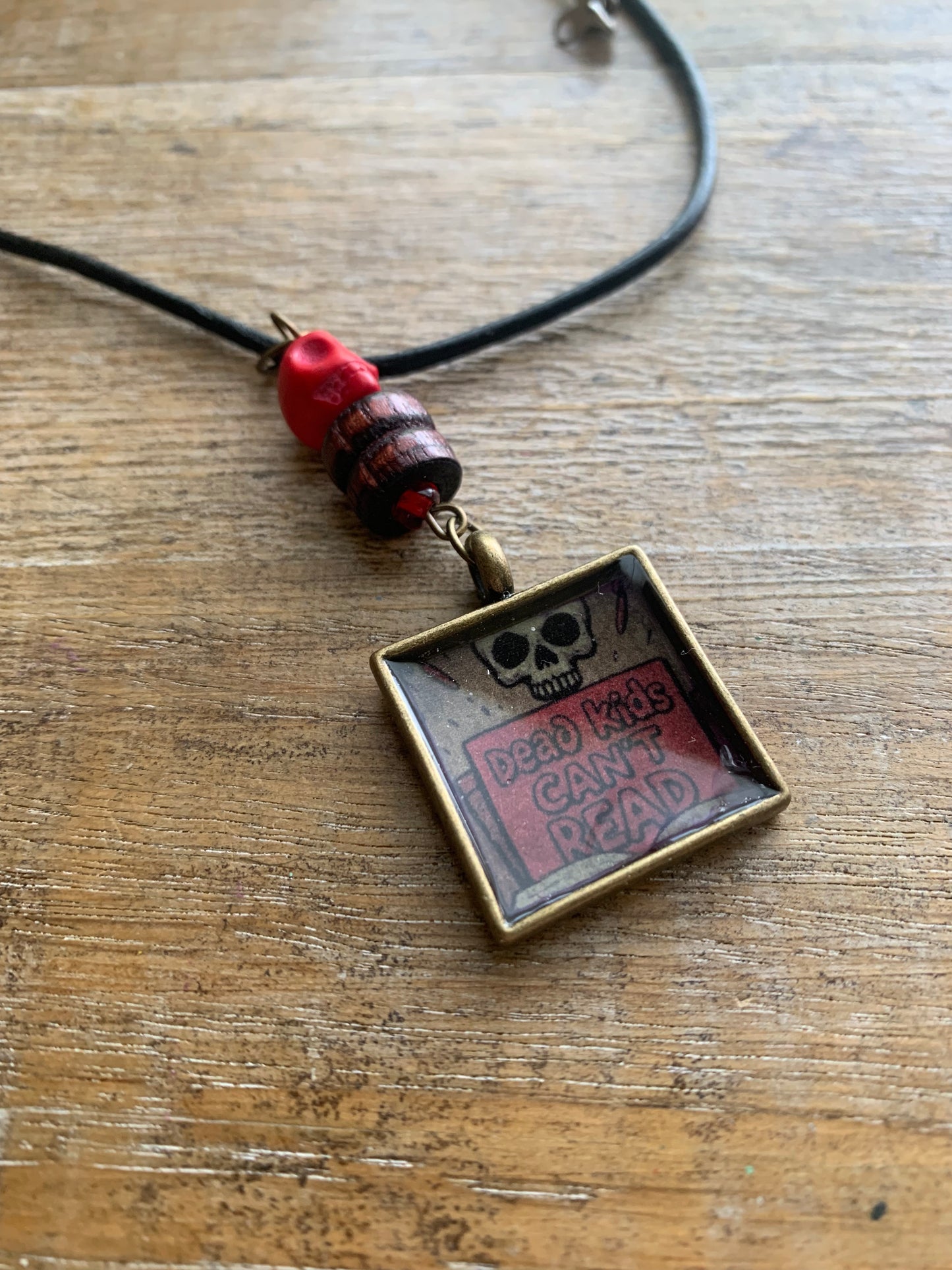 Dead Kids Can’t Read Pendant Necklace Beaded Bronze Tone Gun Control Necklace