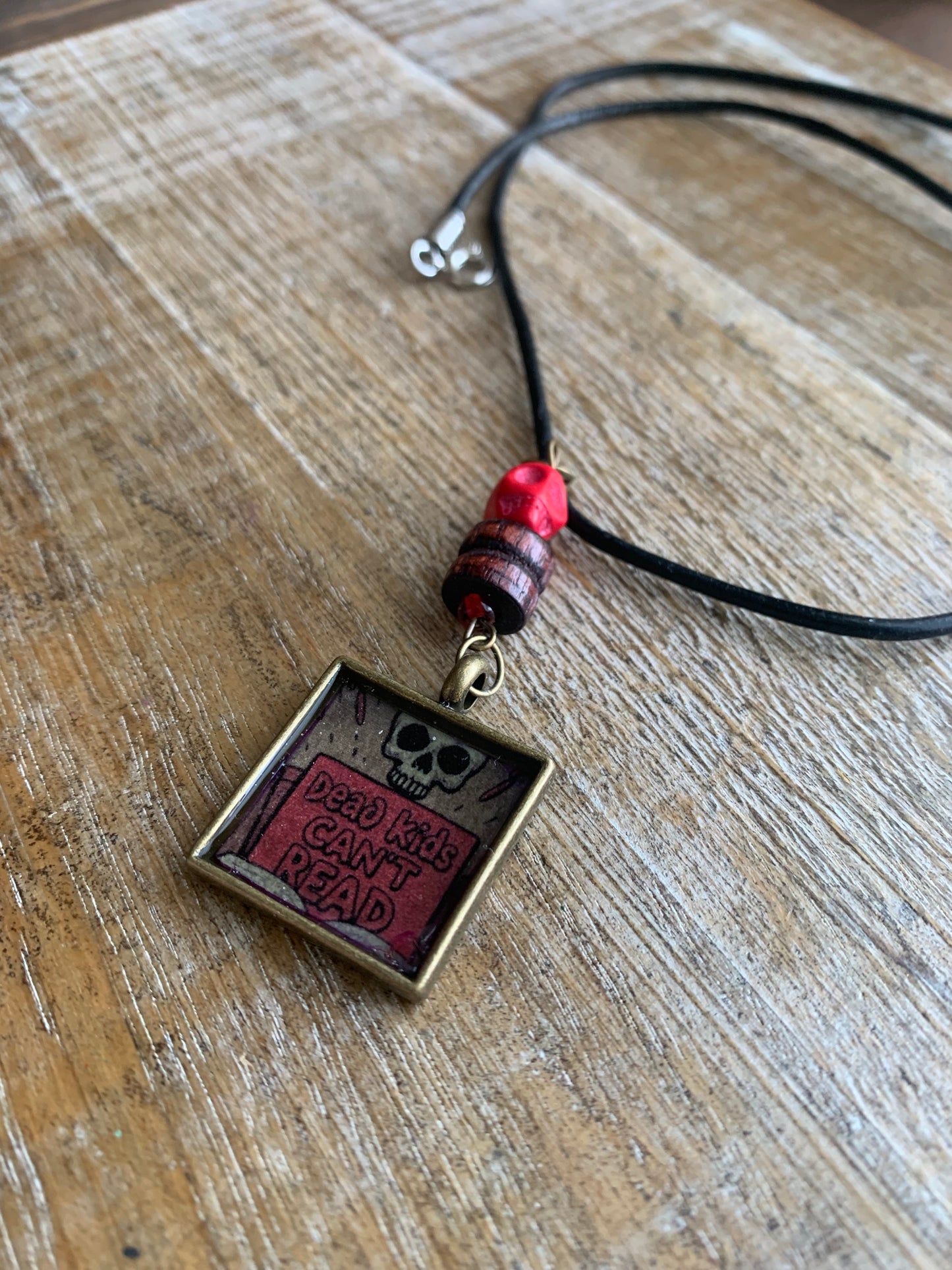 Dead Kids Can’t Read Pendant Necklace Beaded Bronze Tone Gun Control Necklace
