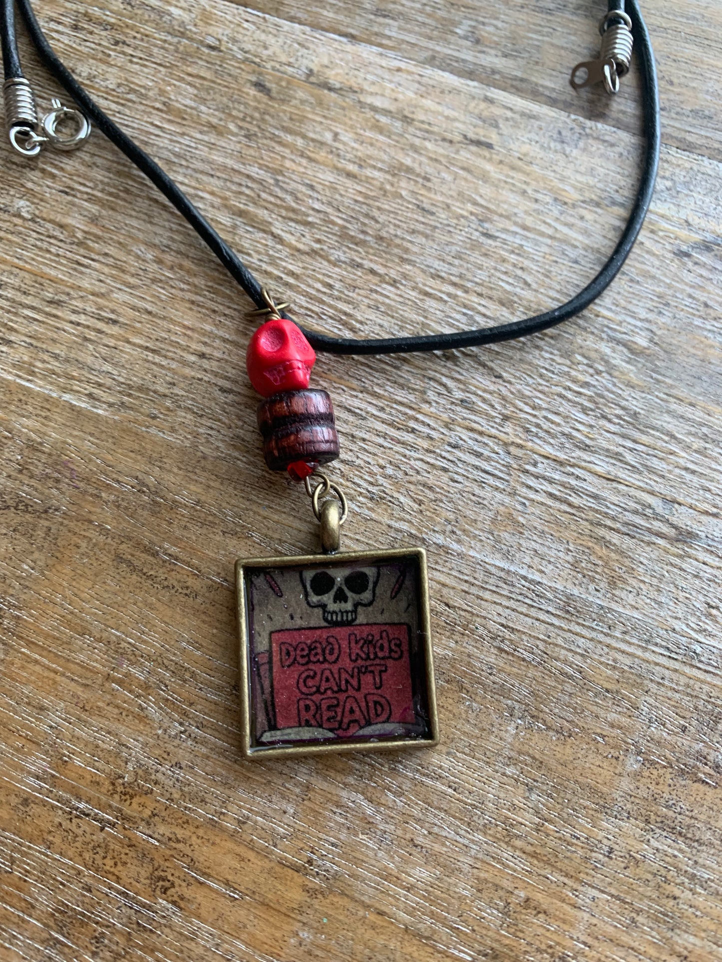 Dead Kids Can’t Read Pendant Necklace Beaded Bronze Tone Gun Control Necklace