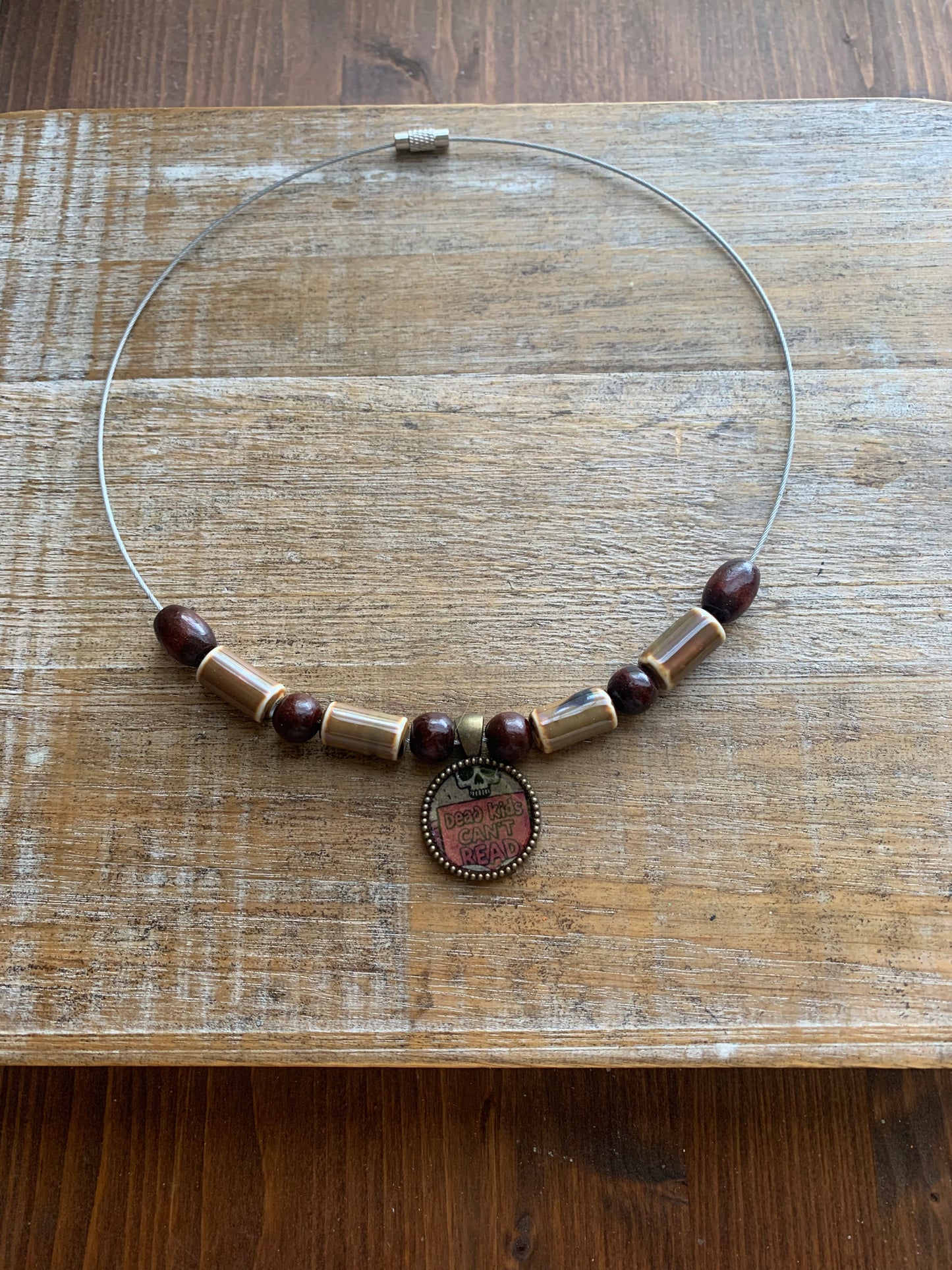 Dead Kids Can’t Read Pendant Necklace Beaded Bronze Tone Gun Control Necklace