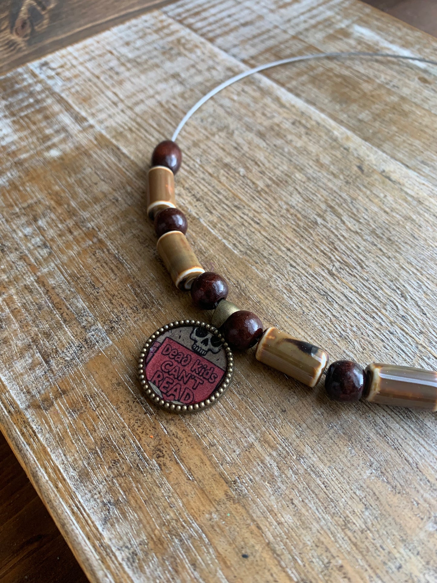 Dead Kids Can’t Read Pendant Necklace Beaded Bronze Tone Gun Control Necklace