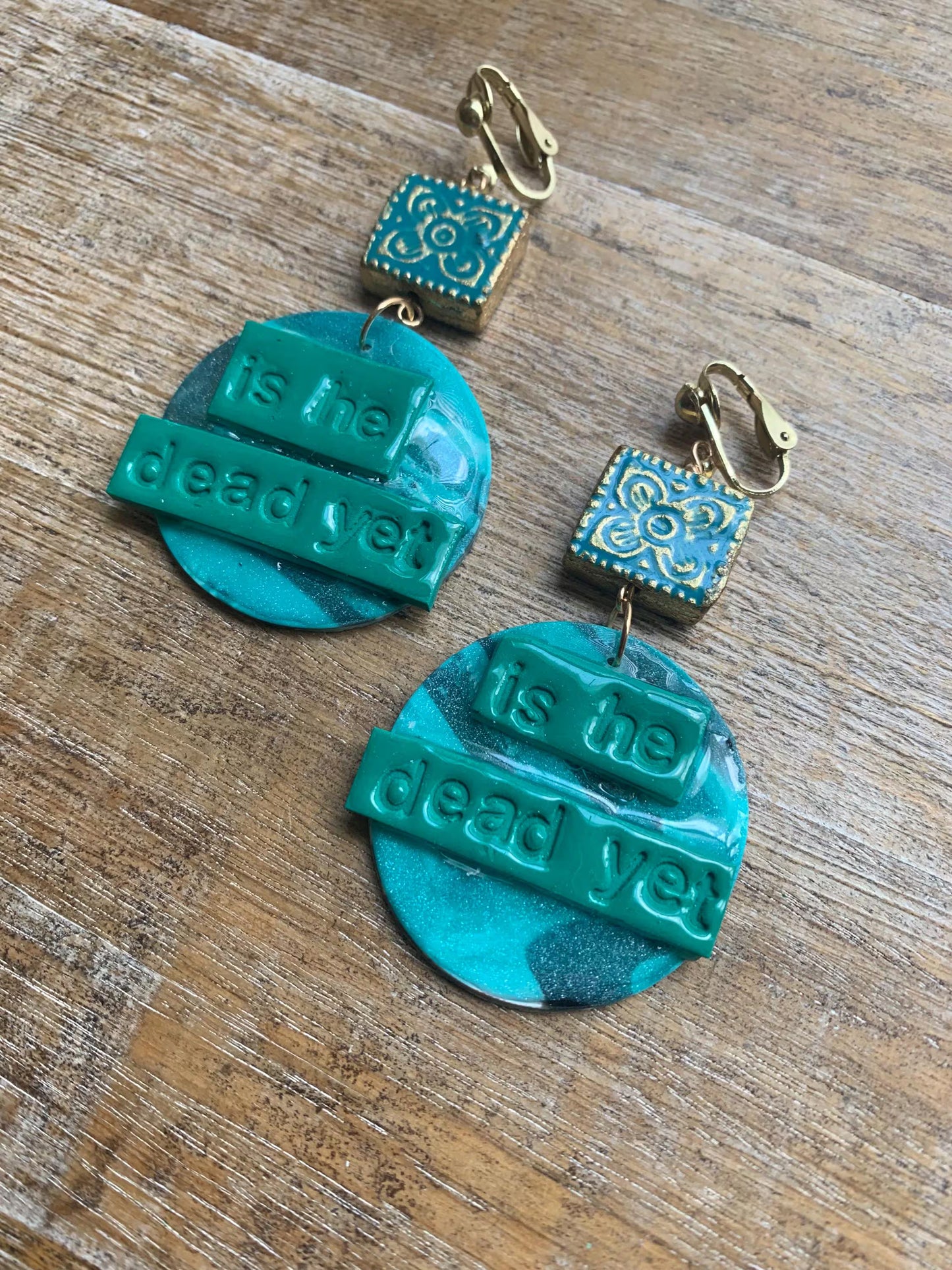 Is He Dead Yet Earrings Clay Protest Liberal Democrat Activist Funny Retro Statement Clip On Earrings Teal Millennial Govt Ear Hangers Blue