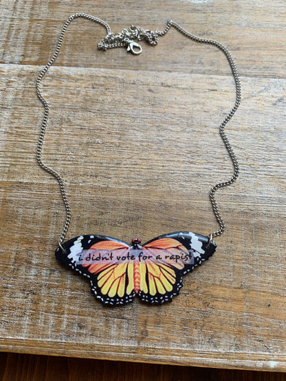 I Didn’t Vote for a Rapist Necklace Monarch Butterfly Gothic Racism Liberal Democrat Necklace Anti Trump Bronze Chain Anti Racism Necklace