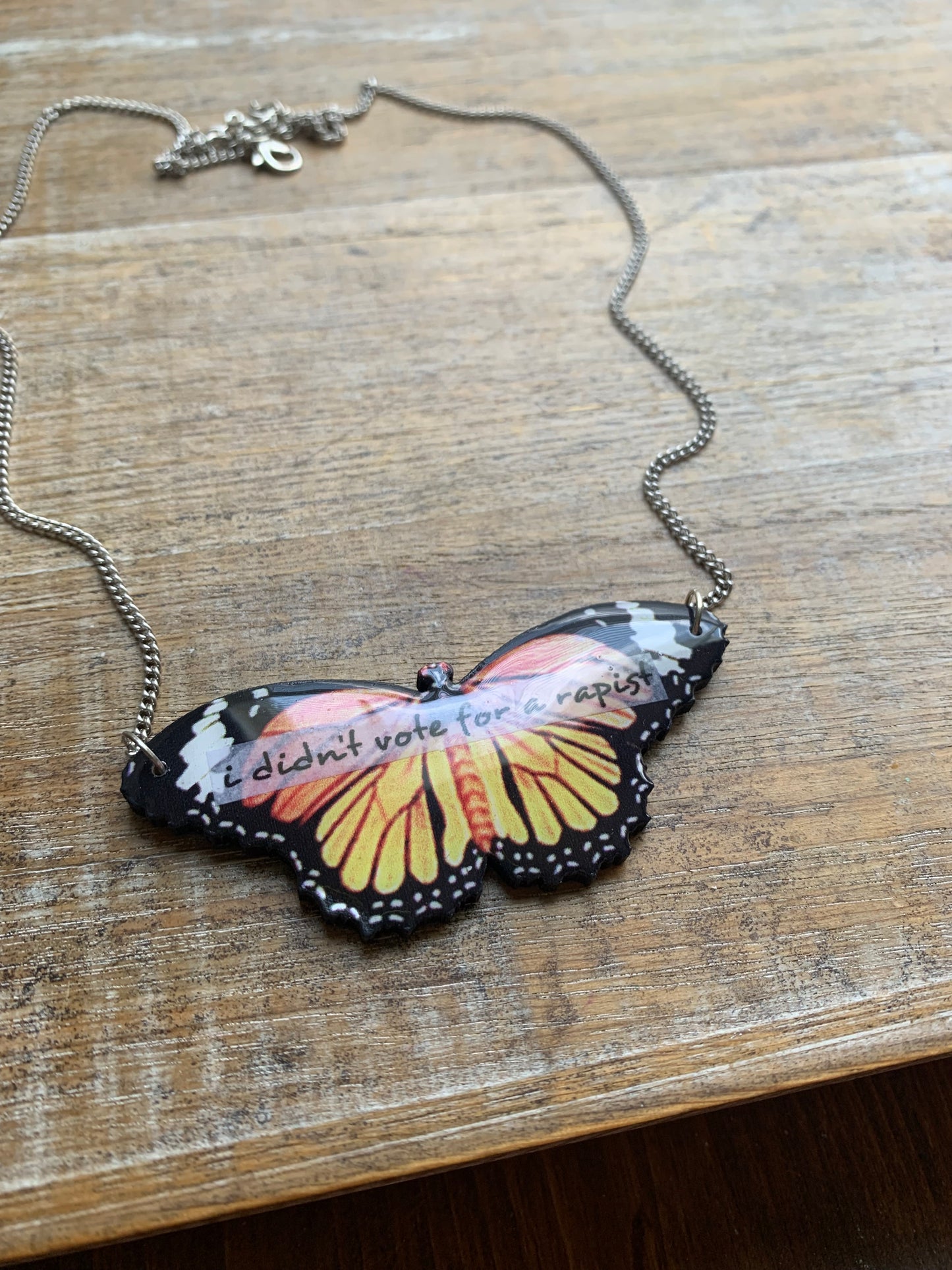 I Didn’t Vote for a Rapist Necklace Monarch Butterfly Gothic Racism Liberal Democrat Necklace Anti Trump Bronze Chain Anti Racism Necklace