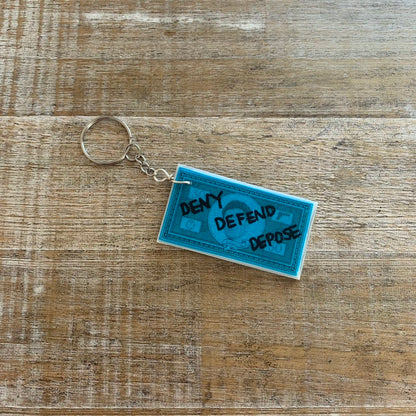Deny Defend Depose Money Luigi Polymer Clay Keychain