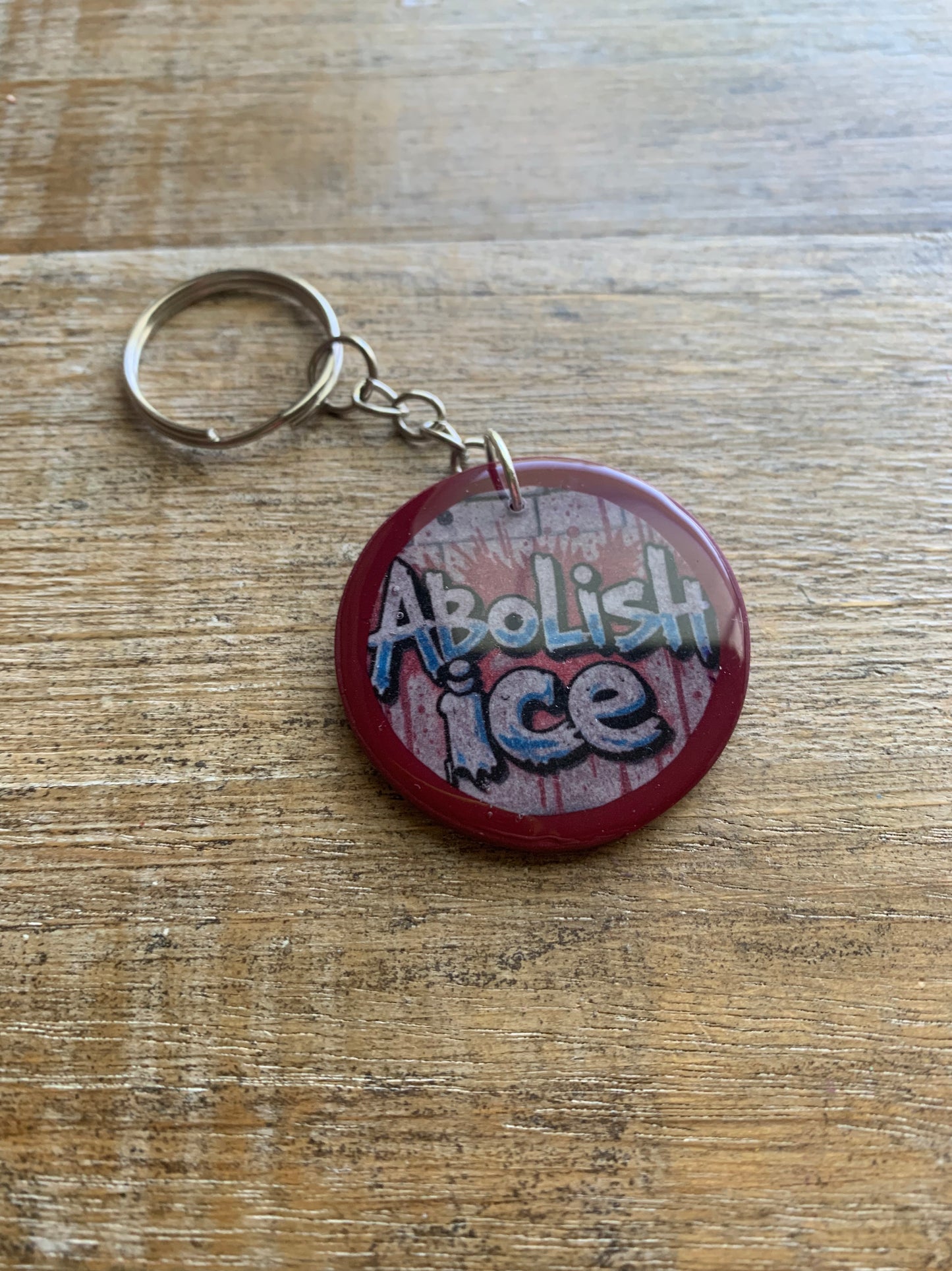 Abolish Ice Burgundy Polymer Clay Keychain
