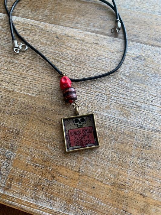 Dead Kids Can’t Read Pendant Necklace Beaded Bronze Tone Gun Control Necklace