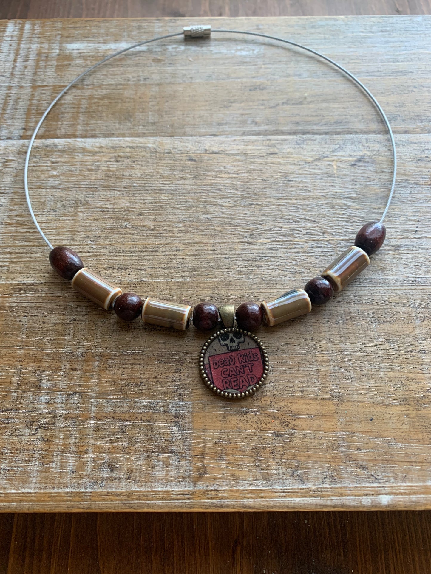 Dead Kids Can’t Read Pendant Necklace Beaded Bronze Tone Gun Control Necklace