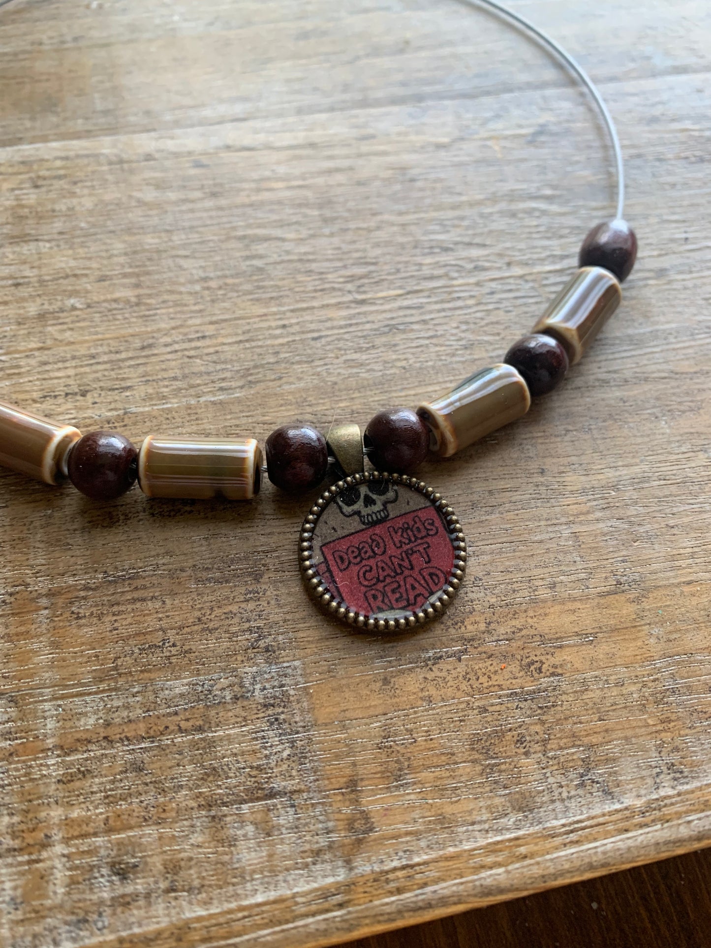 Dead Kids Can’t Read Pendant Necklace Beaded Bronze Tone Gun Control Necklace