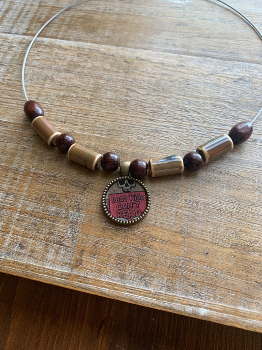 Dead Kids Can’t Read Pendant Necklace Beaded Bronze Tone Gun Control Necklace