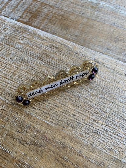 Dead Men Don’t Rape Rhinestone Resin Pin Gold & Purple Glitter Brooch
