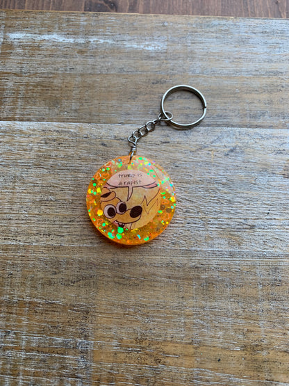 Trump is a Rapist Meme Fire Dog Keychain Orange Circle Keyring