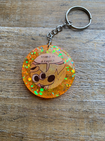 Trump is a Rapist Meme Fire Dog Keychain Orange Circle Keyring