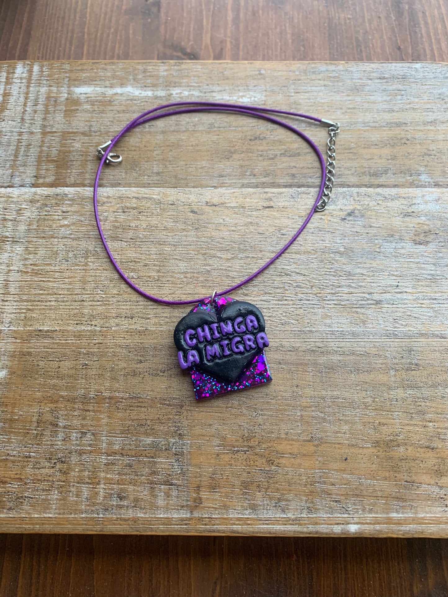 Chinga La Migra Purple & Black Painted Clay Corded Resin Protest Necklace