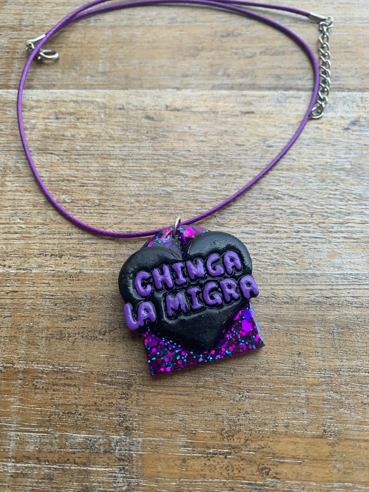 Chinga La Migra Purple & Black Painted Clay Corded Resin Protest Necklace