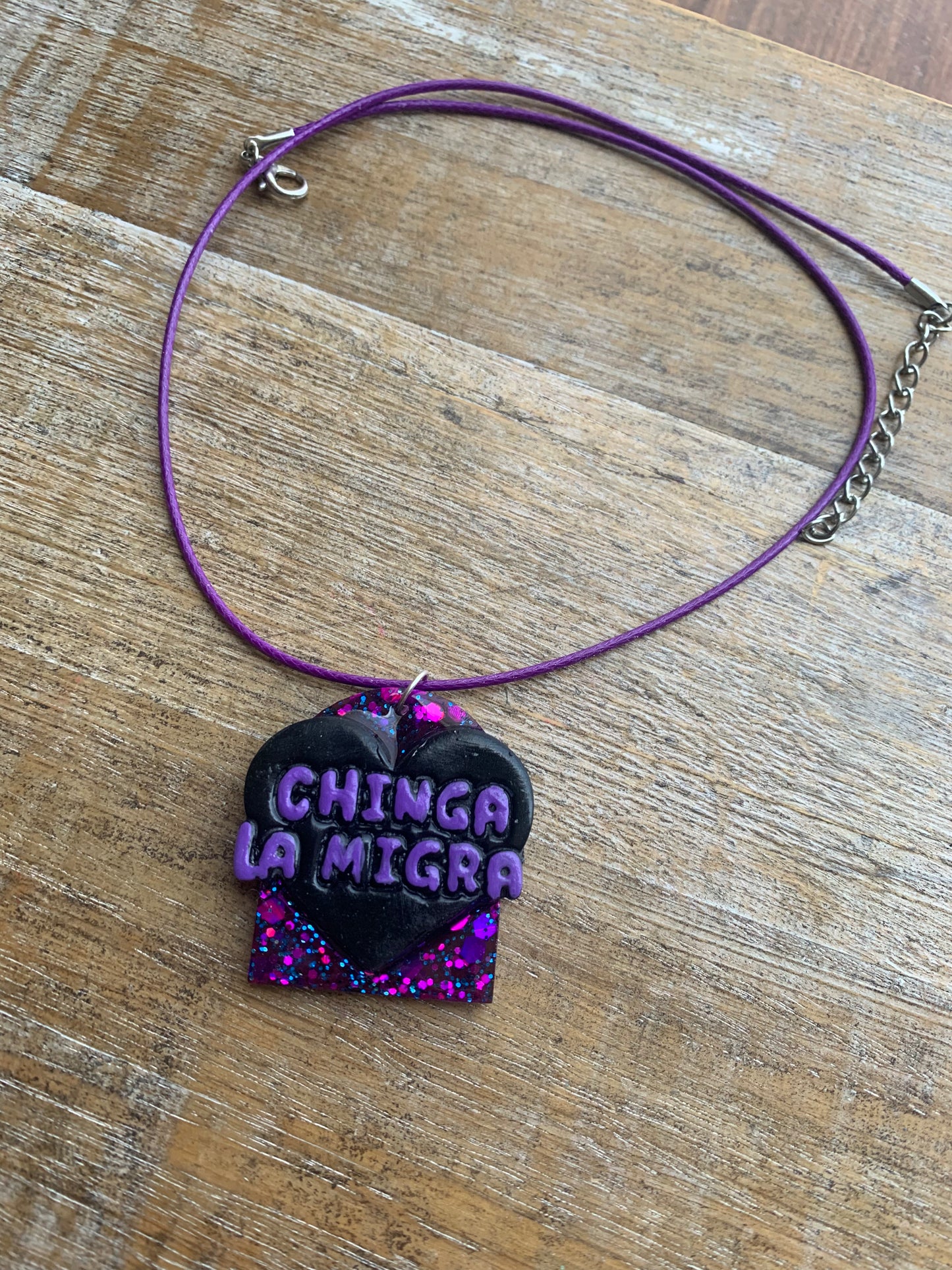 Chinga La Migra Purple & Black Painted Clay Corded Resin Protest Necklace