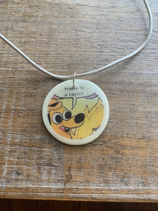 Trump Is a Rapist Fire Meme Necklace