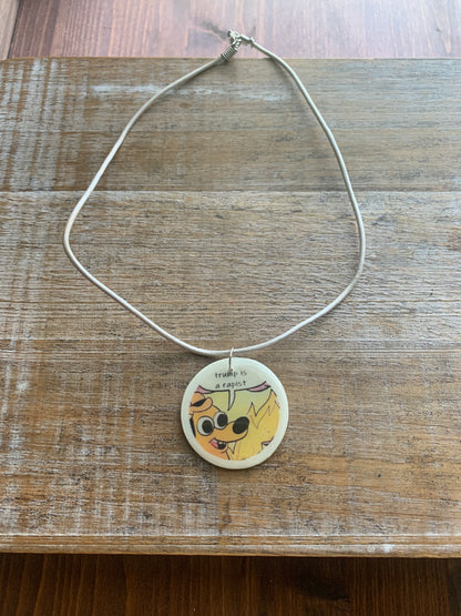 Trump Is a Rapist Fire Meme Necklace