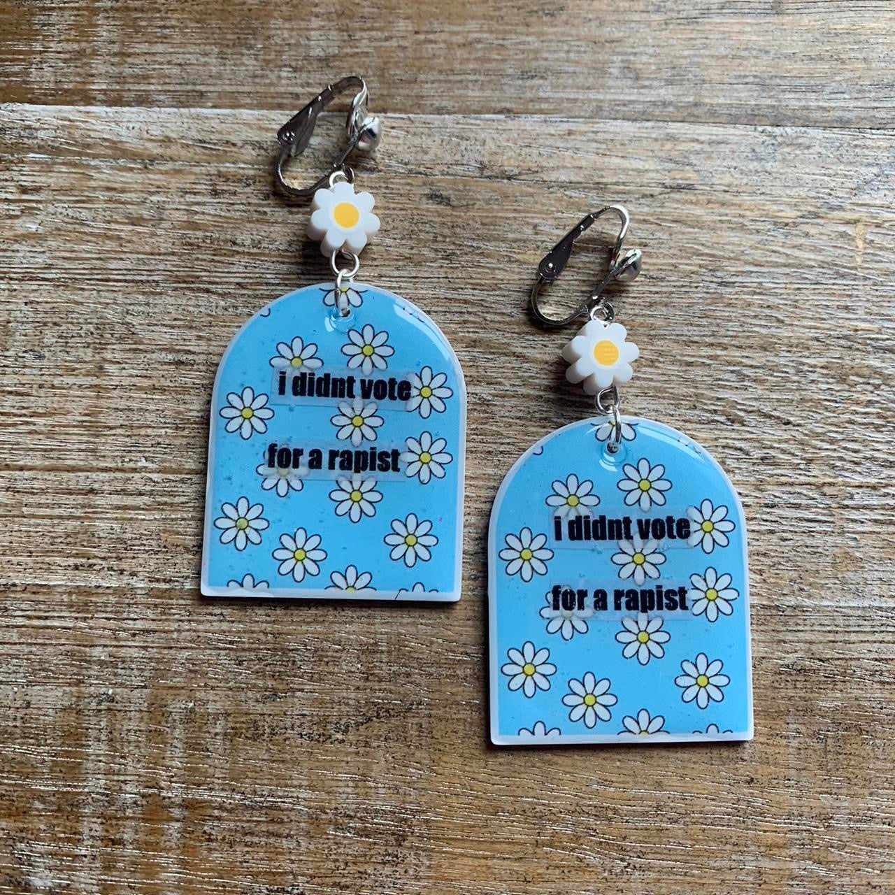 I Didn’t Vote for a Rapist Daisy Clay Clip On Tunnel Gauge Earrings Anti Trump Earrings