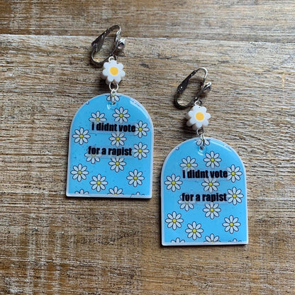 I Didn’t Vote for a Rapist Daisy Clay Clip On Tunnel Gauge Earrings Anti Trump Earrings