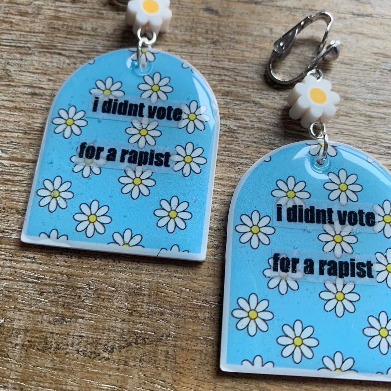 I Didn’t Vote for a Rapist Daisy Clay Clip On Tunnel Gauge Earrings Anti Trump Earrings