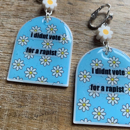 I Didn’t Vote for a Rapist Daisy Clay Clip On Tunnel Gauge Earrings Anti Trump Earrings