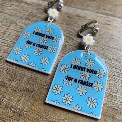 I Didn’t Vote for a Rapist Daisy Clay Clip On Tunnel Gauge Earrings Anti Trump Earrings