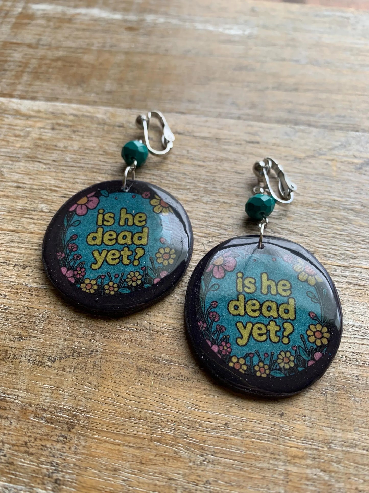 Is He Dead Yet Clip On Earrings Clay Protest Liberal Democrat Activist Funny Retro Flowers Clip On Earrings Teal Millennial Govt Ear Hangers