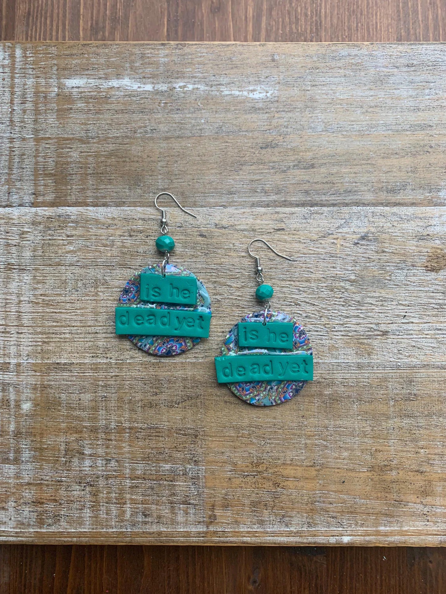 Is He Dead Yet Earrings Clay Protest Liberal Democrat Activist Funny Retro Statement Clip On Earrings Green Millennial Teal Ear Hangers